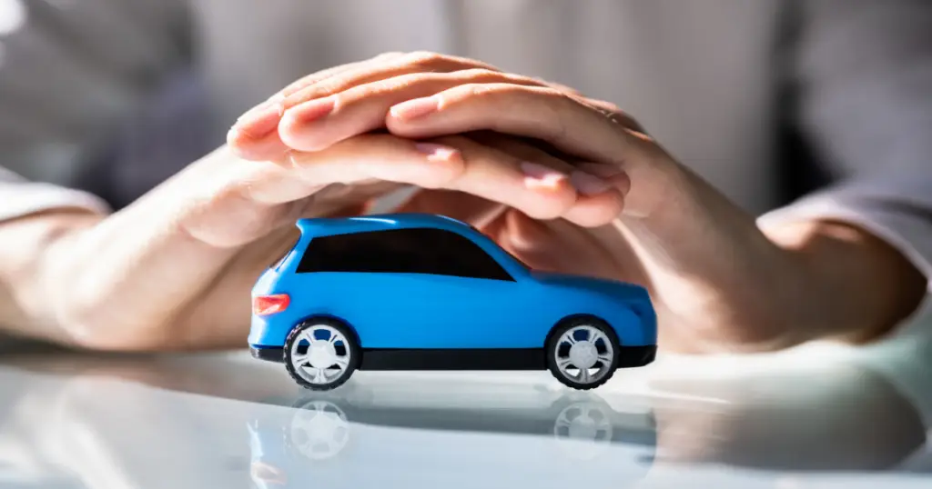 Hands_protecting_Car_Insurance